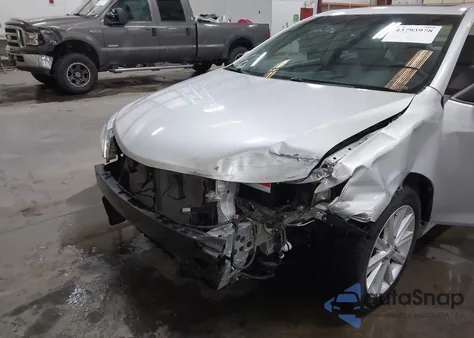 2012 Toyota Camry Xle z USA, uszkodzony, nr VIN 4T1BF1FK9CU584932